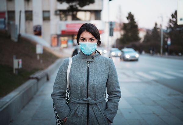 Young Woman with Mask